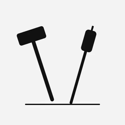A crossed hammer and screwdriver