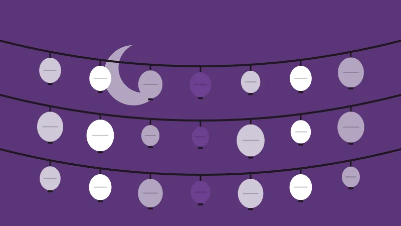 Three strings of paper lanterns against a deep evening sky with a moon