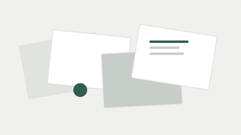 Overlapping sheets of paper, one with three ruled lines